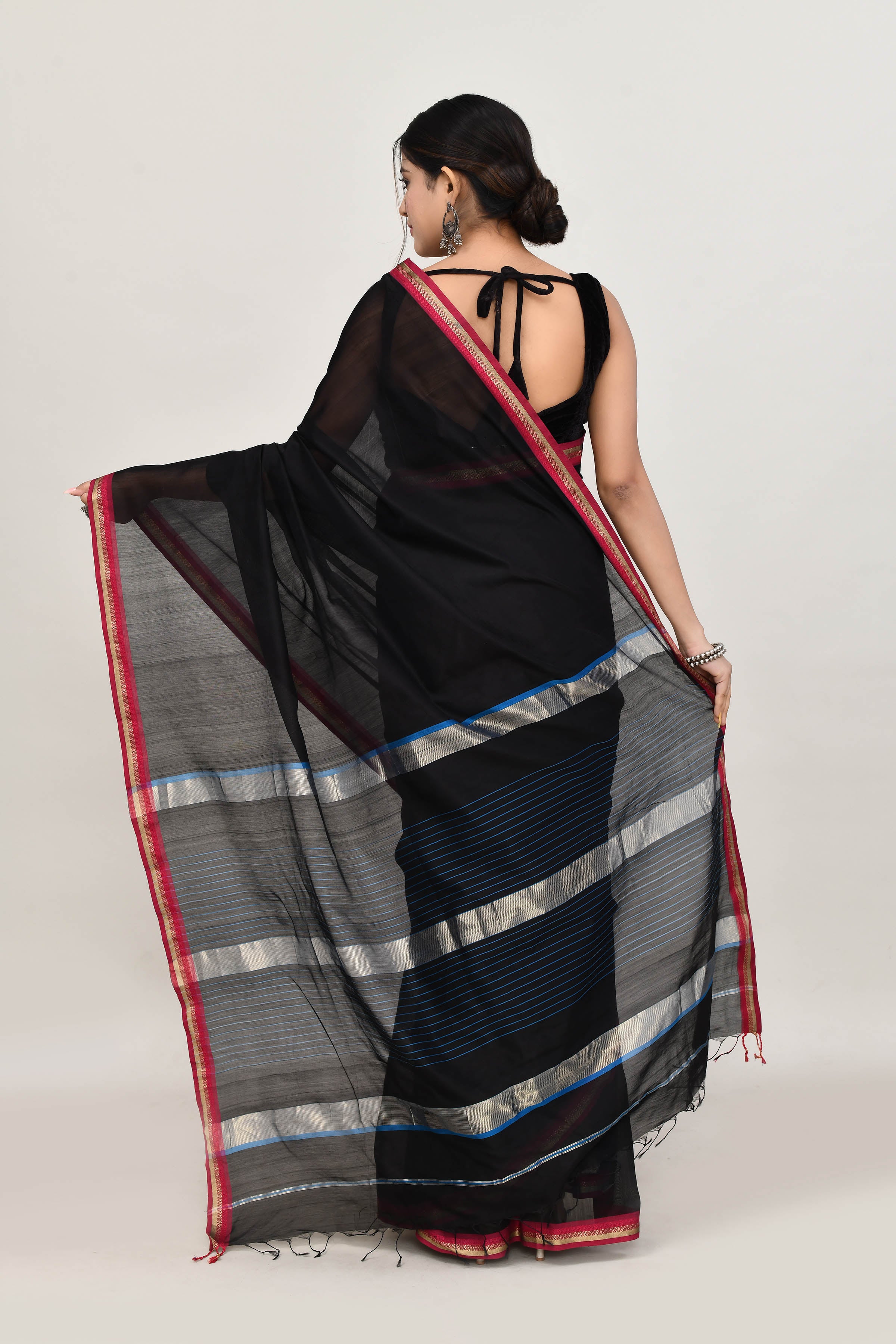 Black cotton silk hand woven saree with dark pink and golden border