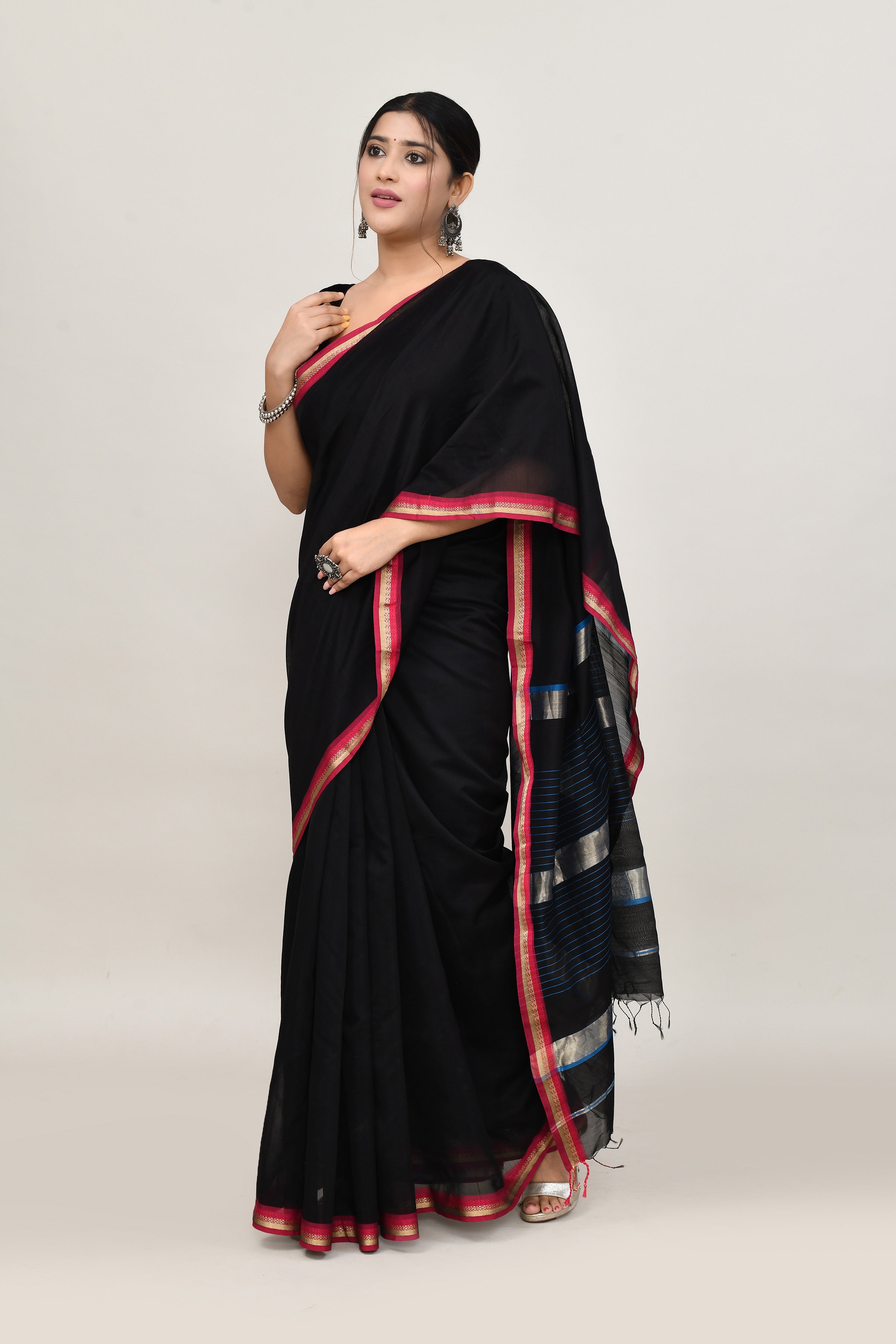 Black cotton silk hand woven saree with dark pink and golden border