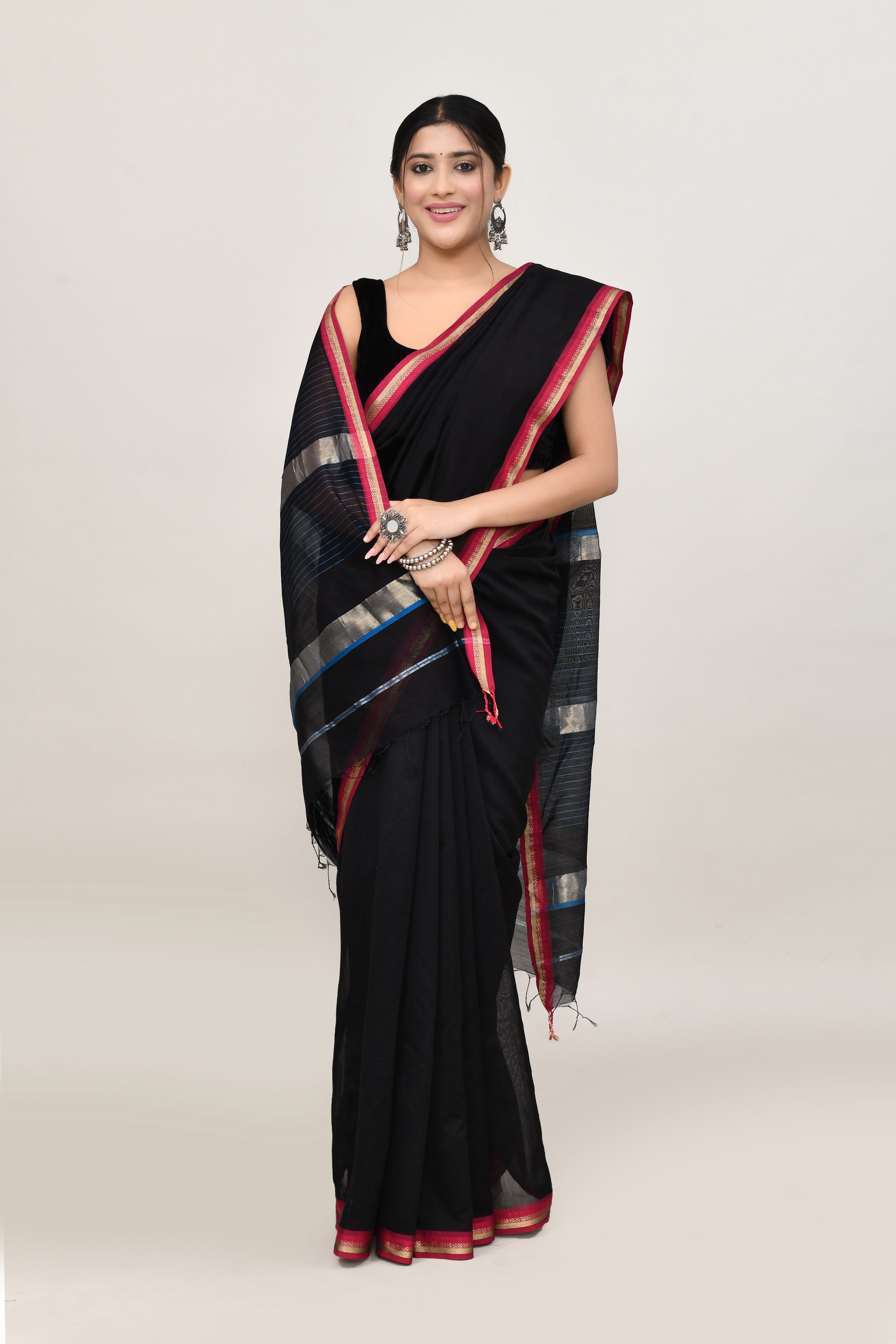 Black cotton silk hand woven saree with dark pink and golden border