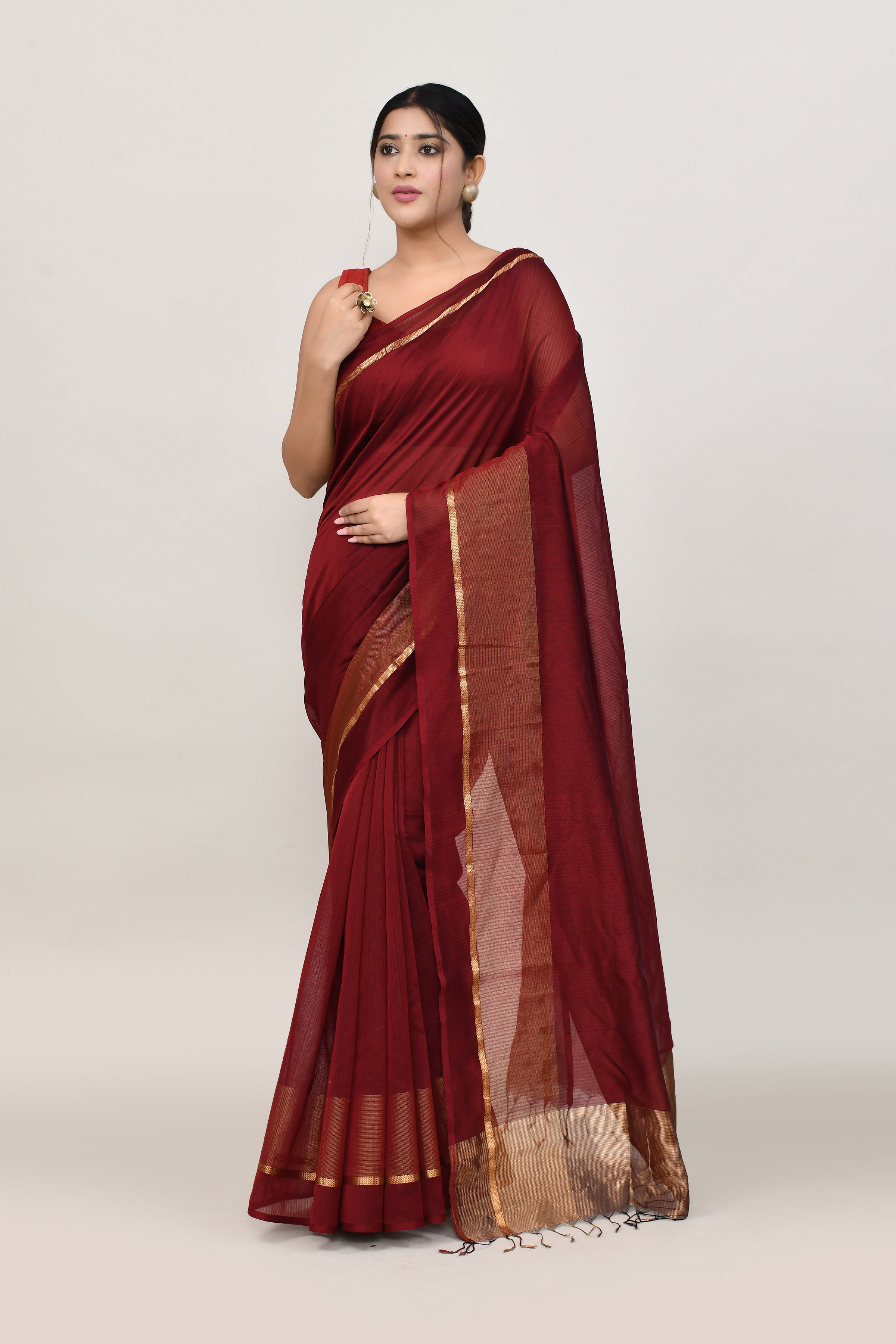 Maroon cotton silk handwoven saree with self stripes and gold pallu