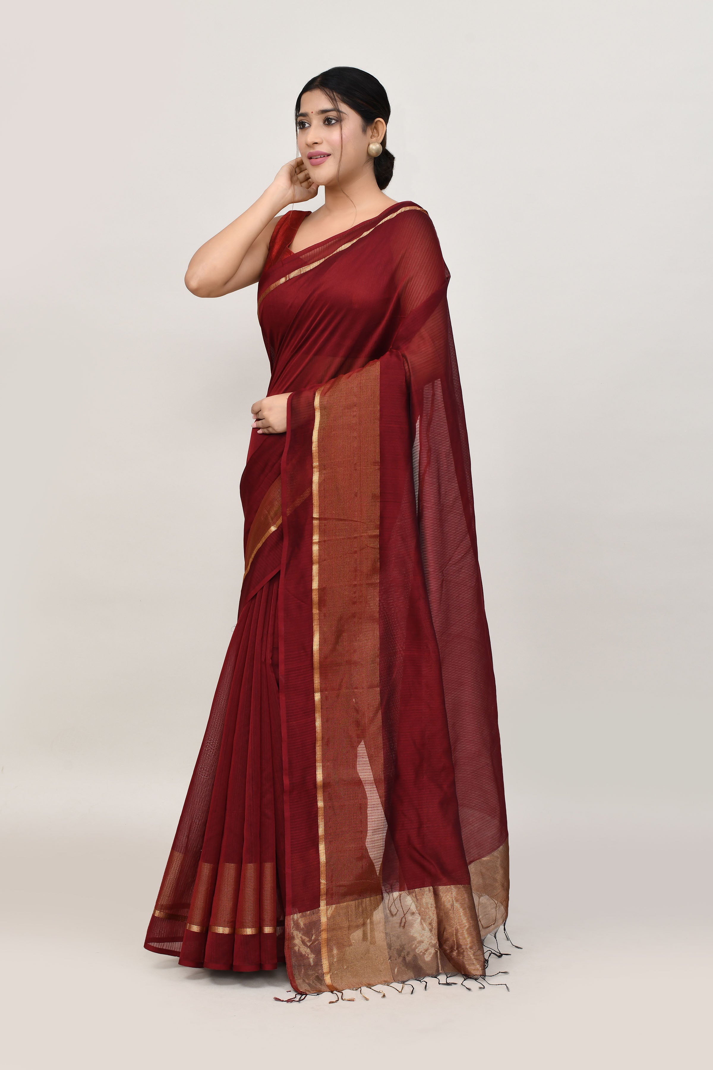 Maroon cotton silk handwoven saree with self stripes and gold pallu