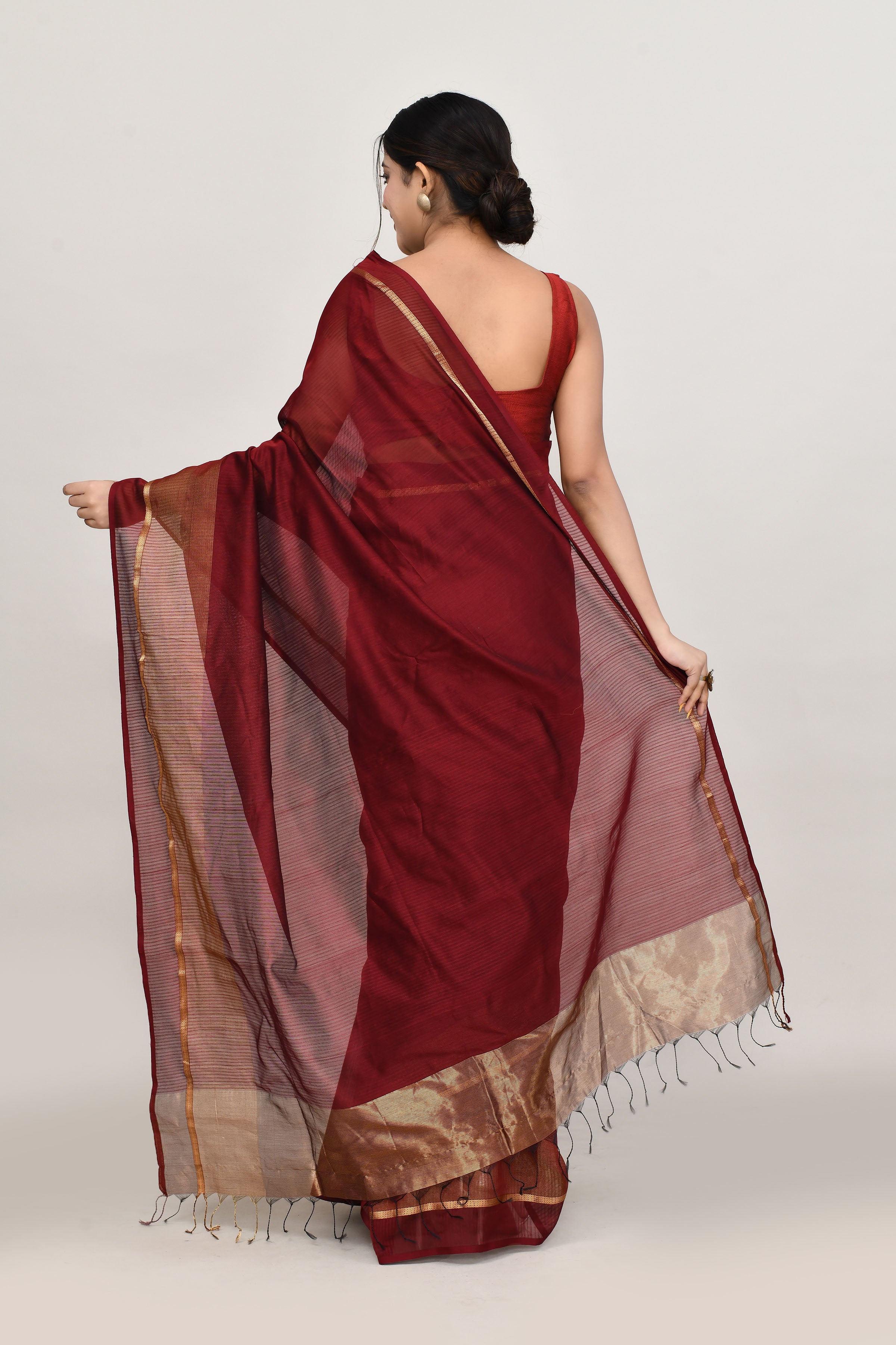 Maroon cotton silk handwoven saree with self stripes and gold pallu