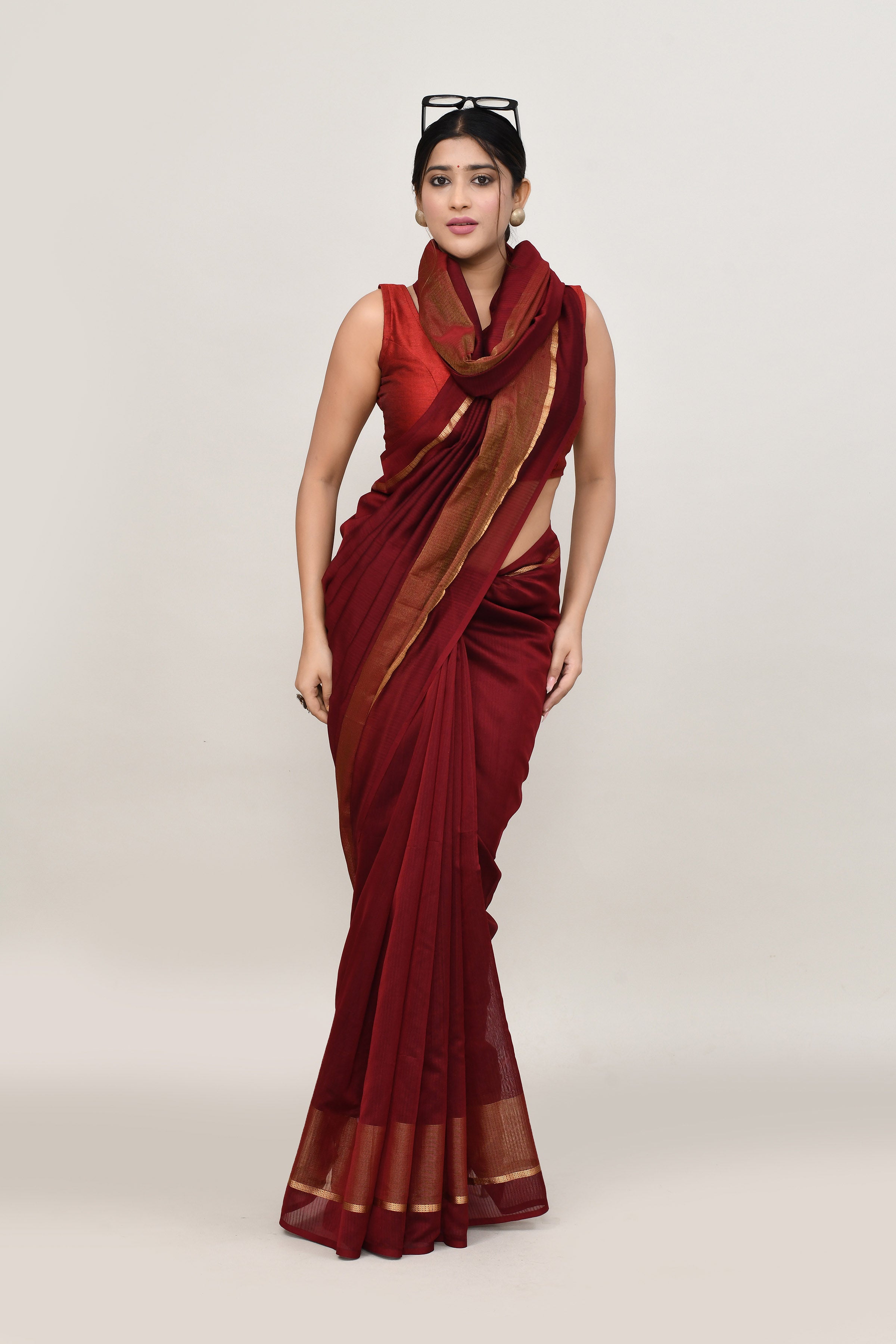 Maroon cotton silk handwoven saree with self stripes and gold pallu