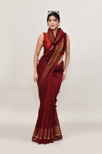 Maroon cotton silk handwoven saree with self stripes and gold pallu