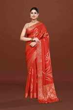 Banarasi soft silk saree with floral golden motifs weaving- carrot Red