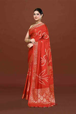 Banarasi soft silk saree with floral golden motifs weaving- carrot Red