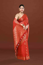 Banarasi soft silk saree with floral golden motifs weaving- carrot Red