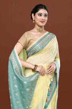 Banarasi soft silk saree with mirror work and dark blue and gold zari woven border and pallu- Lemon Yellow