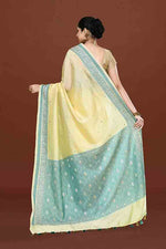 Banarasi soft silk saree with mirror work and dark blue and gold zari woven border and pallu- Lemon Yellow