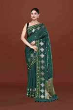 Banarasi soft silk saree with gold and silver zari weaving and cutdana embroidery in border- Dark Green