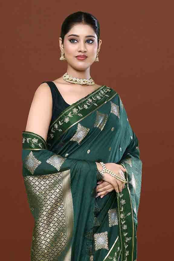 Banarasi soft silk saree with gold and silver zari weaving and cutdana embroidery in border- Dark Green