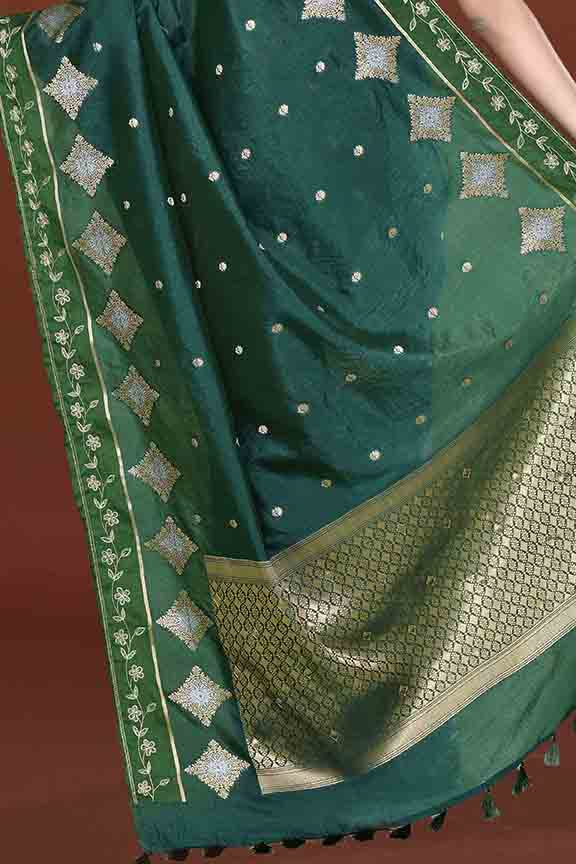 Banarasi soft silk saree with gold and silver zari weaving and cutdana embroidery in border- Dark Green