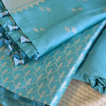 Ice Blue Handwoven Banarasi Munga Muslin Suit Set with Zari Butis & Ornate Border
