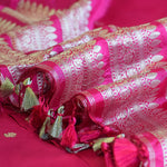Rani Pink Handwoven Banarasi Munga Muslin Suit Set with Intricate Zari Borders & Playful Tassels