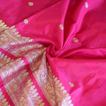 Rani Pink Handwoven Banarasi Munga Muslin Suit Set with Intricate Zari Borders & Playful Tassels
