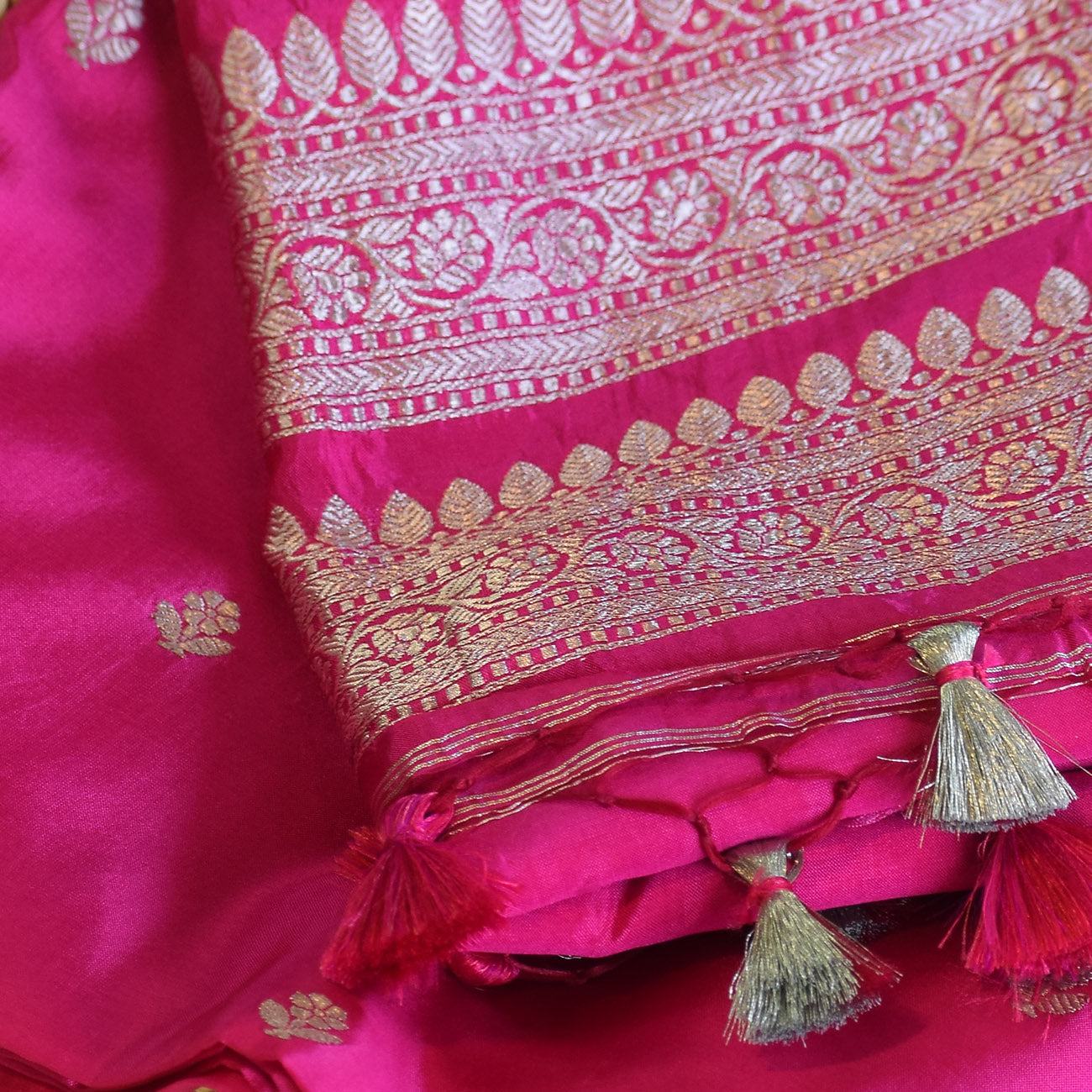 Rani Pink Handwoven Banarasi Munga Muslin Suit Set with Intricate Zari Borders & Playful Tassels